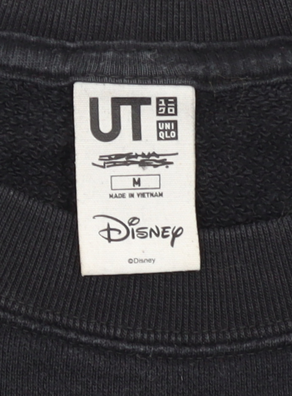 Brand and care label for Uniqlo Disney Mickey Mouse Black Sweatshirt Women M Crew Neck Cotton