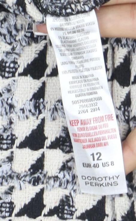 Brand and care label for Dorothy Perkins Women’s Black Houndstooth Tweed Pinafore Dress, size UK 12
