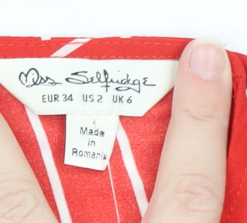 Brand and care label for Miss Selfridge Women's Red Striped Sleeveless Wrap Blouse, size 6