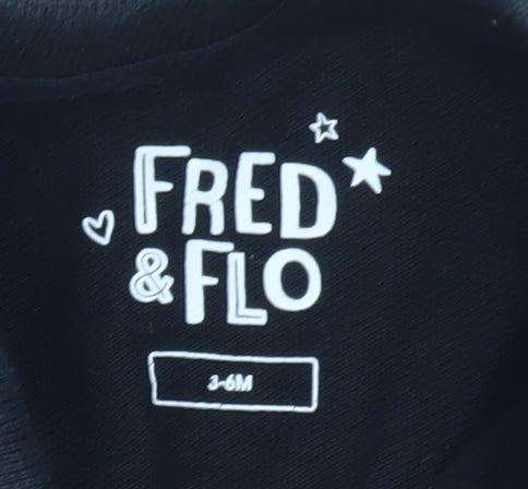 Brand and care label for F&F unisex baby black polo shirt 3-6 months cotton dinosaur