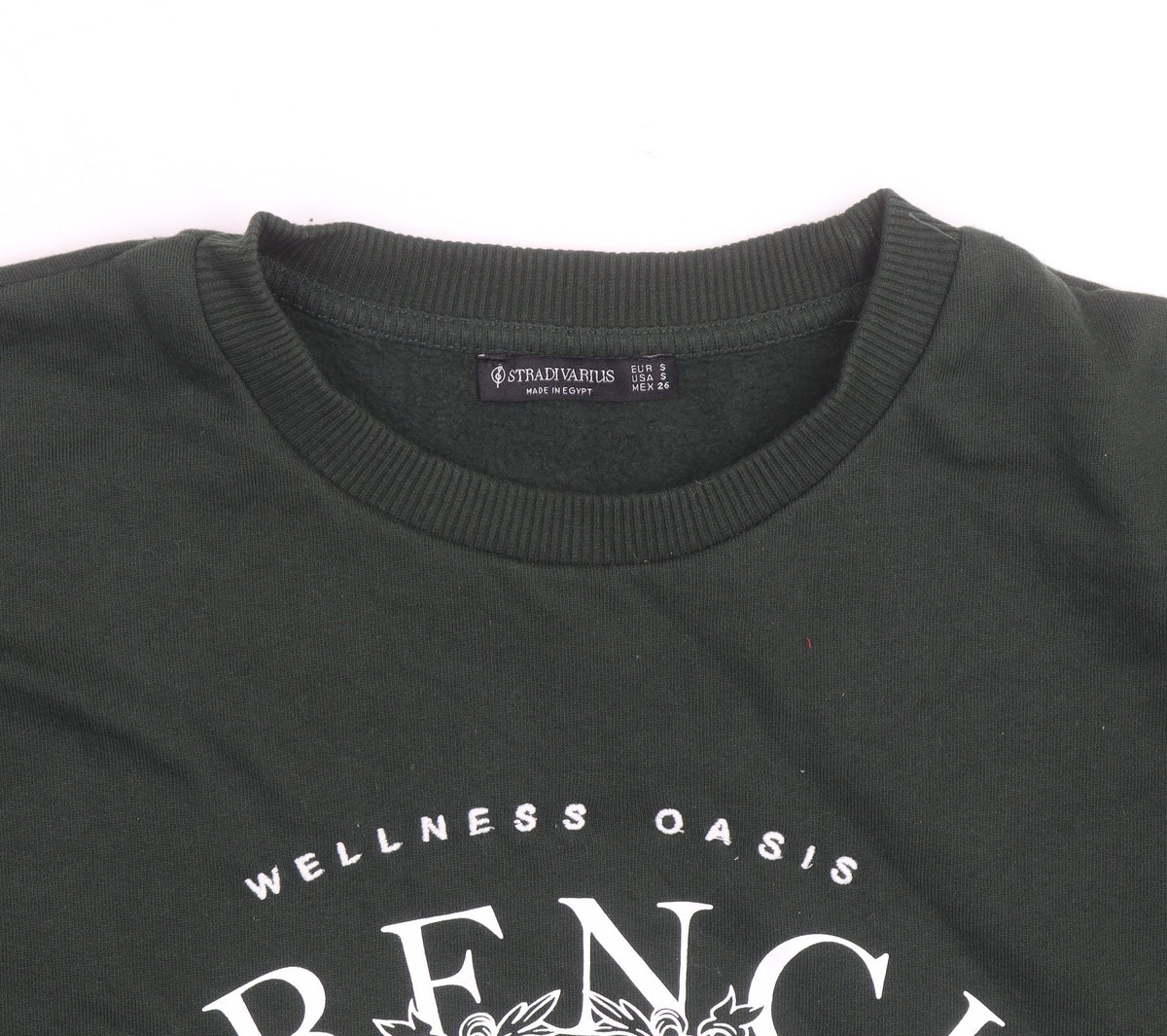 Brand and care label for Stradivarius unisex dark green french riviera graphic sweatshirt, size S