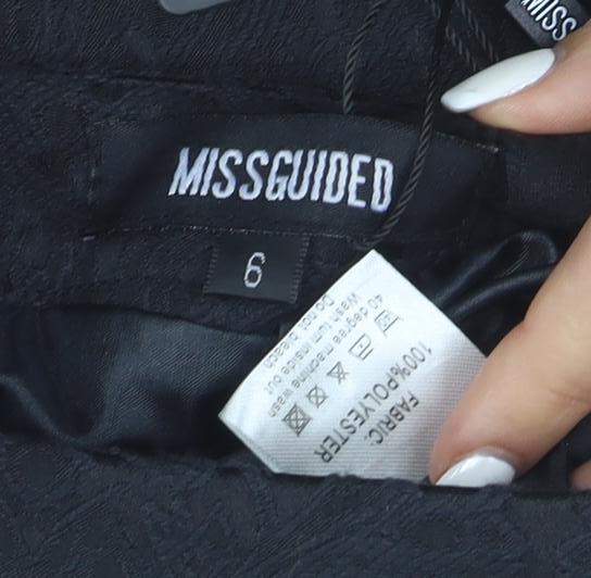 Brand and care label for Missguided Women's Black Lace Hem Pencil Skirt, size 6