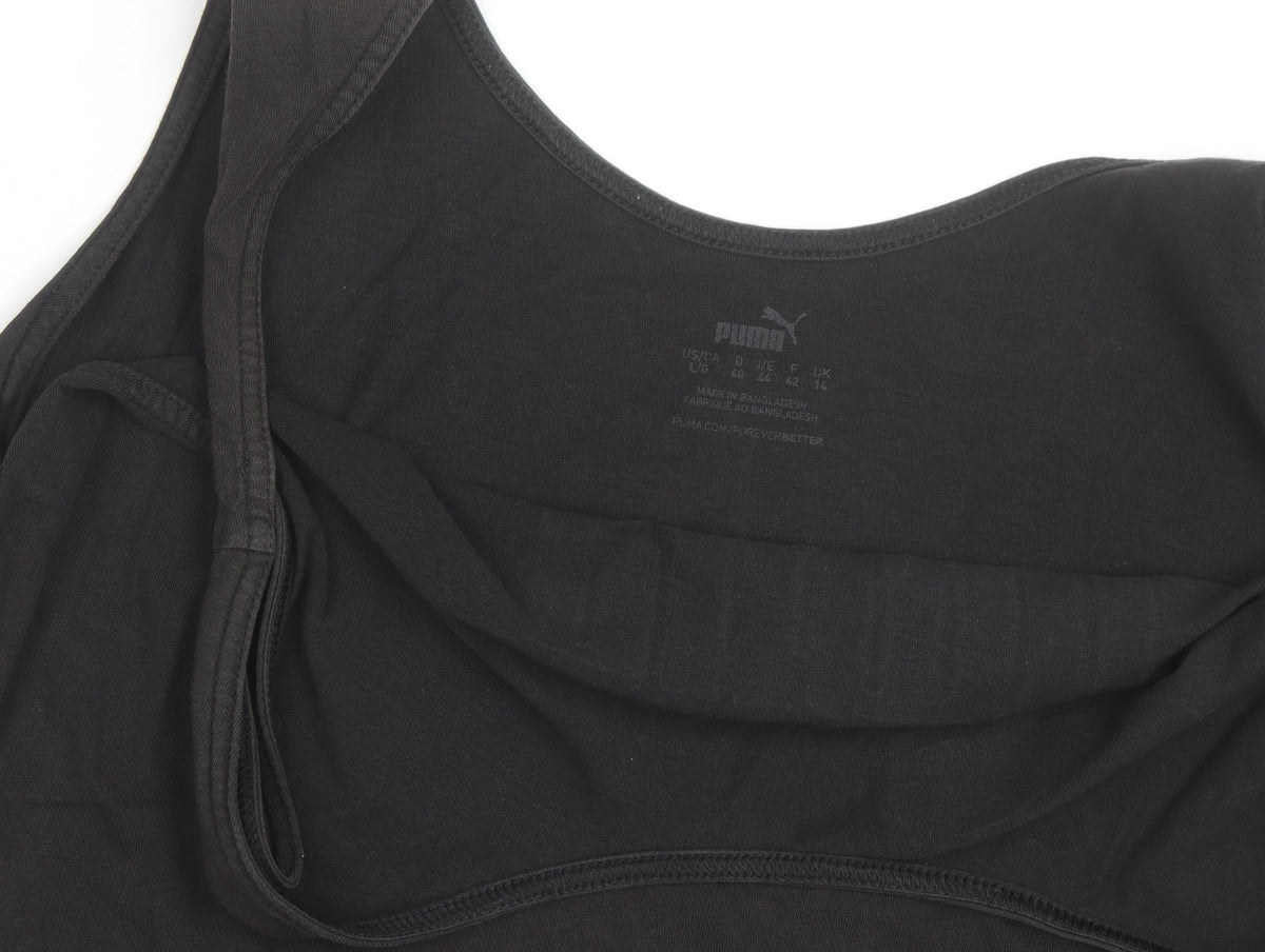 Brand and care label for Puma women’s black sports tank top, size UK 14, cotton blend