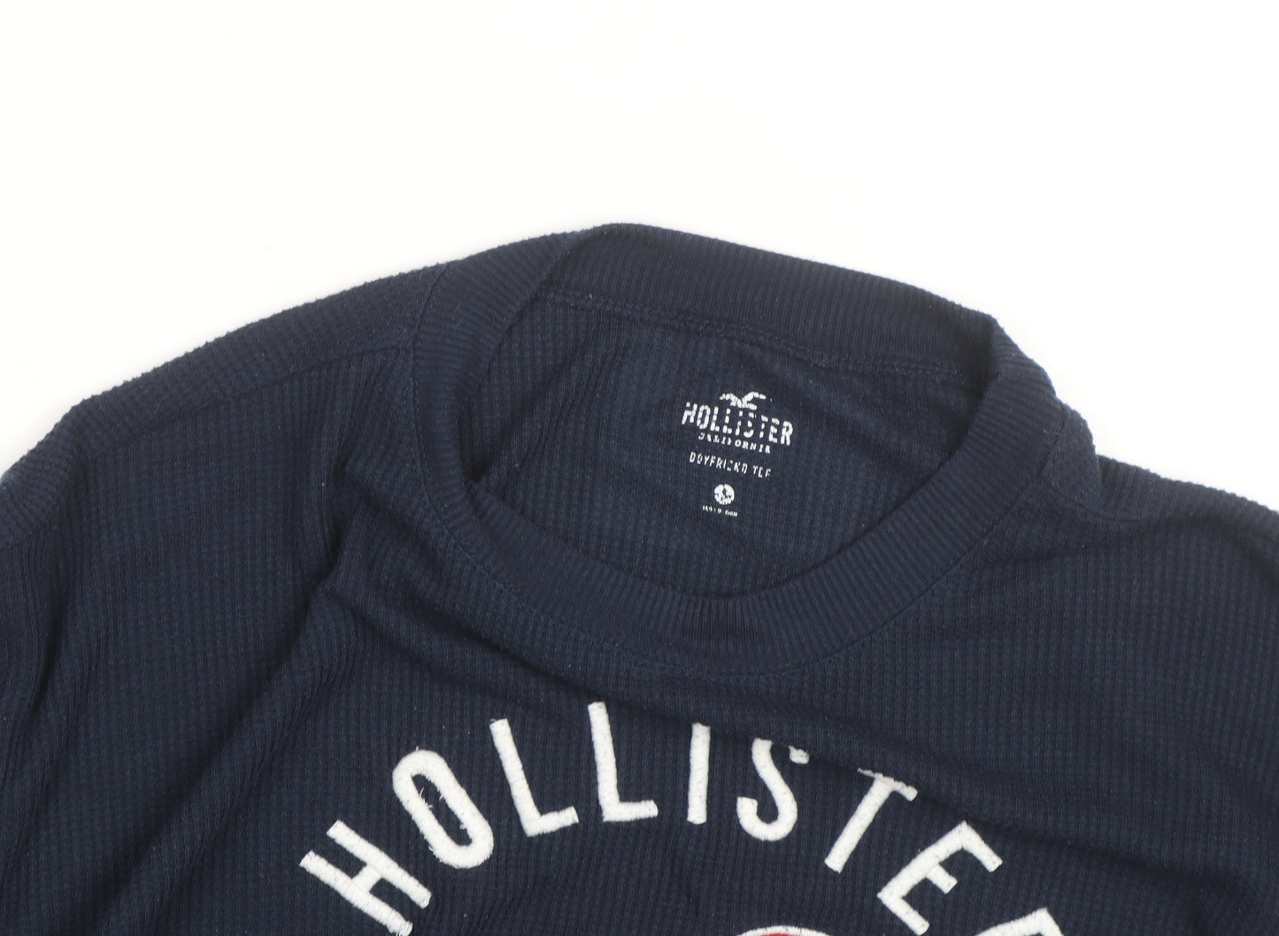 Brand and care label for Hollister unisex navy blue waffle-knit jumper l