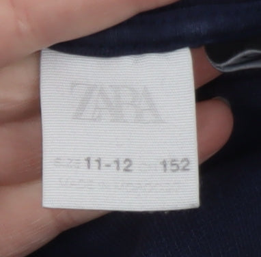 Brand and care label for Zara boys’ blue pokémon pikachu pullover fleece hoodie 11-12 years