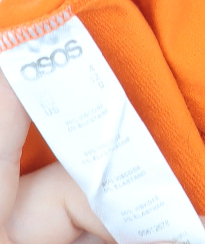 Brand and care label for ASOS Women’s Orange Smocked Short Skater Dress, size UK 8