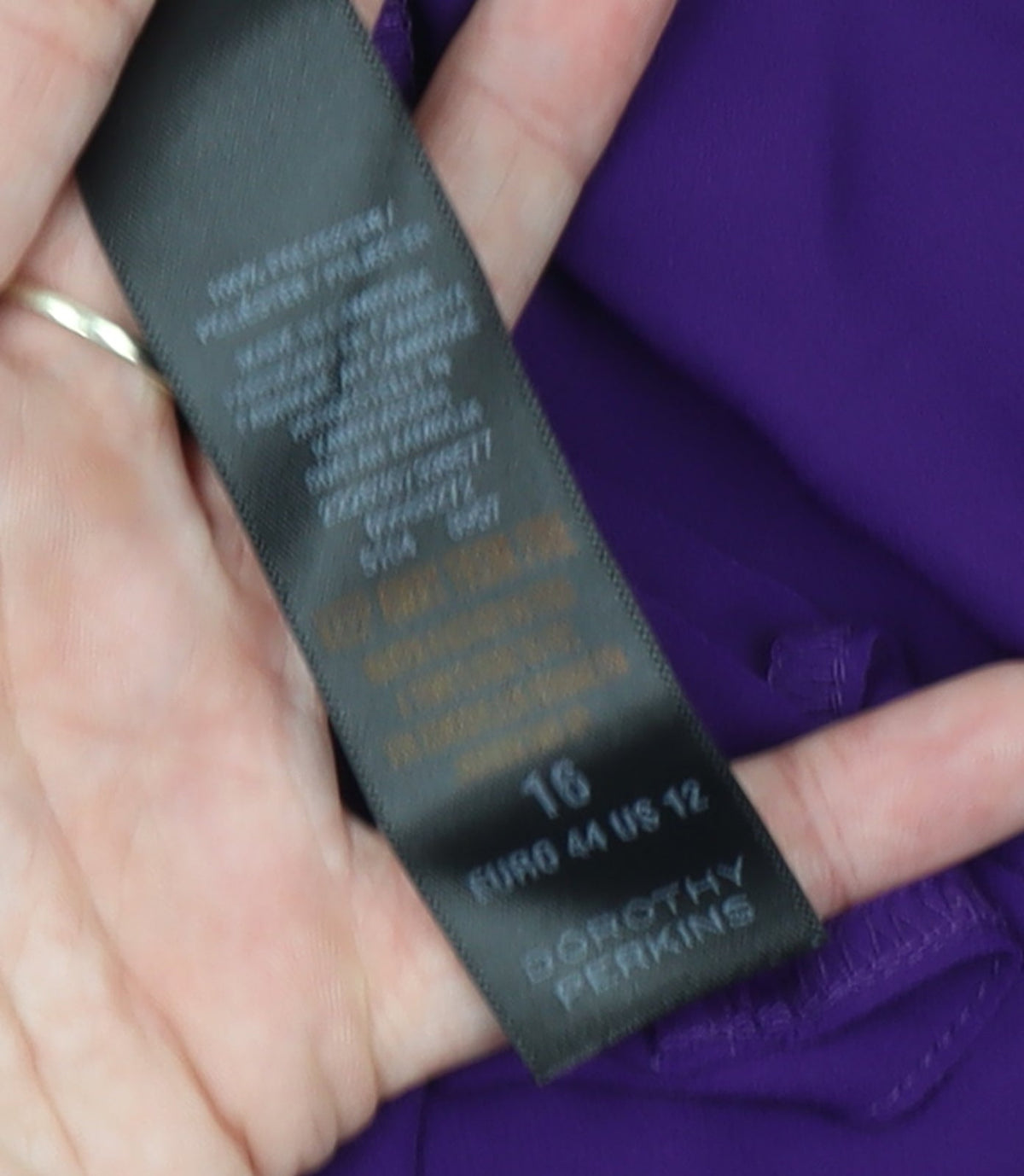 Brand and care label for Dorothy Perkins Women's Purple Sleeveless Tank Top, size 16