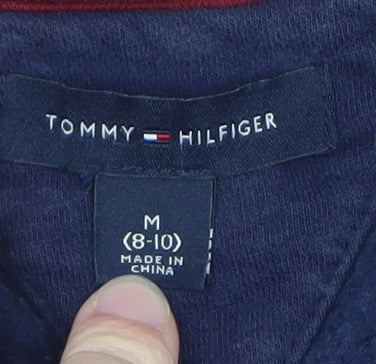 Brand and care label for Tommy Hilfiger boys’ navy blue zip up hoodie jacket, size 8-10, years