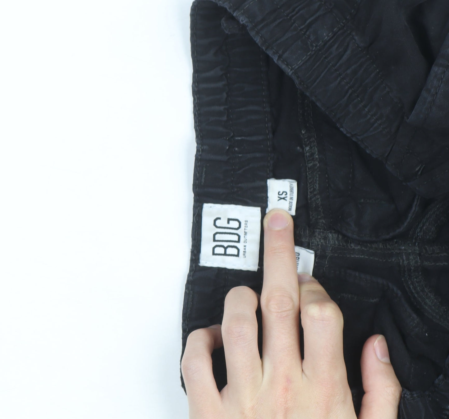 Brand and care label for BDG Men's Black XS Cargo Trousers Elastic Waist Cotton