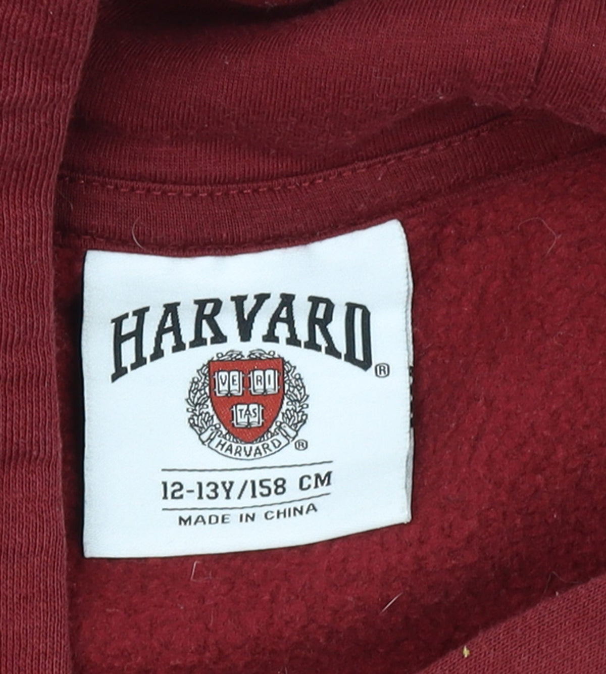 Brand and care label for Harvard boys’ burgundy hoodie 12-13 years pullover fleece sweatshirt