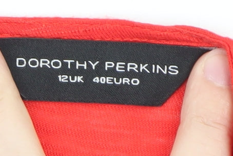 Brand and care label for Dorothy Perkins Women's Red Lace Tunic Blouse, size 12