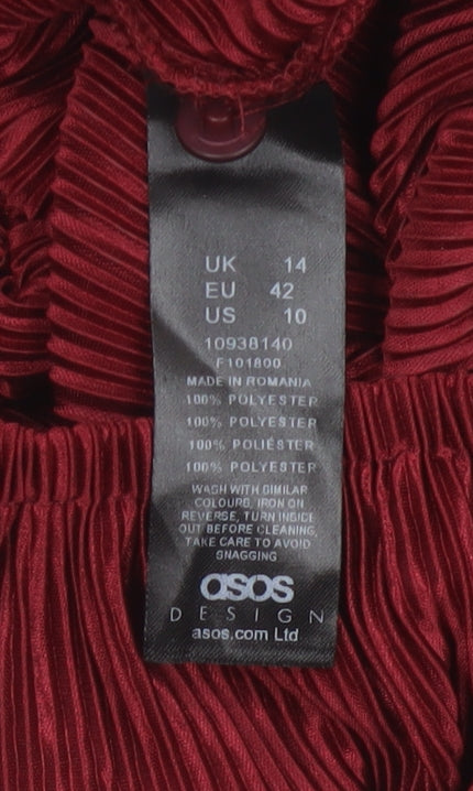 Brand and care label for ASOS Design Women’s Red Pleated Wide-Leg Velvet Jumpsuit, size UK 14
