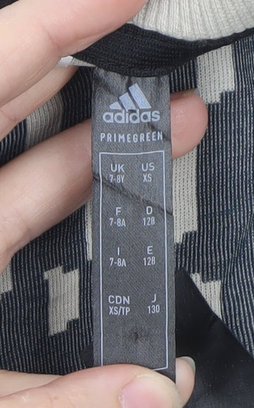 Brand and care label for Adidas boys’ grey patterned crew neck sweatshirt xs 7-8y primegreen
