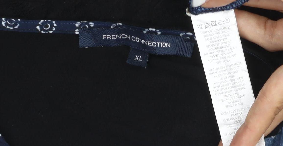 Brand and care label for French Connection Women's Blue Floral Blouse XL Short Sleeve