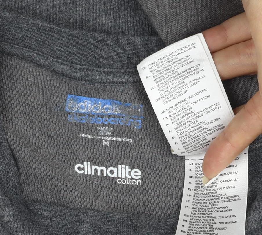 Brand and care label for Adidas unisex grey climalite skateboarding t-shirt, size M