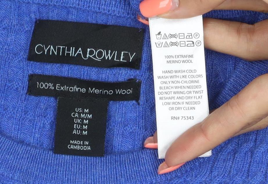 Brand and care label for Cynthia Rowley unisex blue m merino wool cable knit crew neck jumper