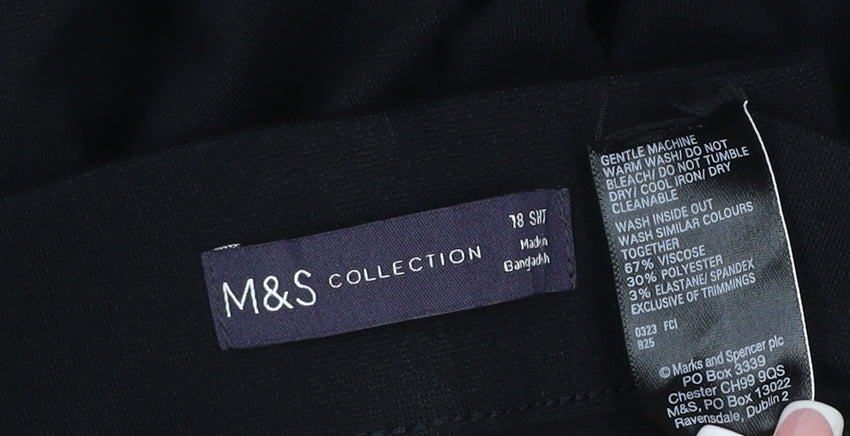 Brand and care label for Marks & Spencer unisex black 38 short stretch dress trousers