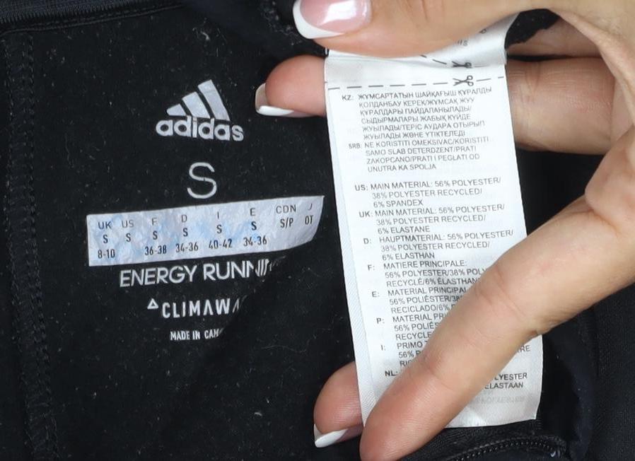 Brand and care label for Adidas unisex black s energy run climawarm 1/4 zip running sweatshirt