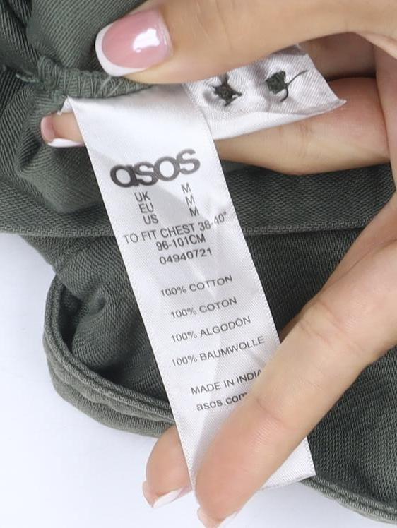Brand and care label for ASOS Men Green M Military Field Jacket Cotton Button Pockets