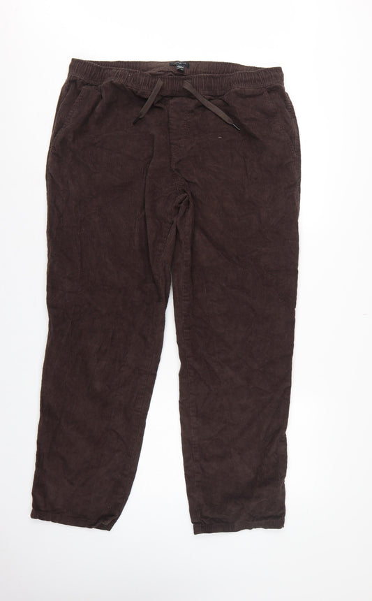 Back view of New Look unisex brown corduroy jogger trousers xl cotton