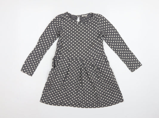 Back view of Mini Boden girls’ grey polka dot skater dress 7-8 years long sleeve
