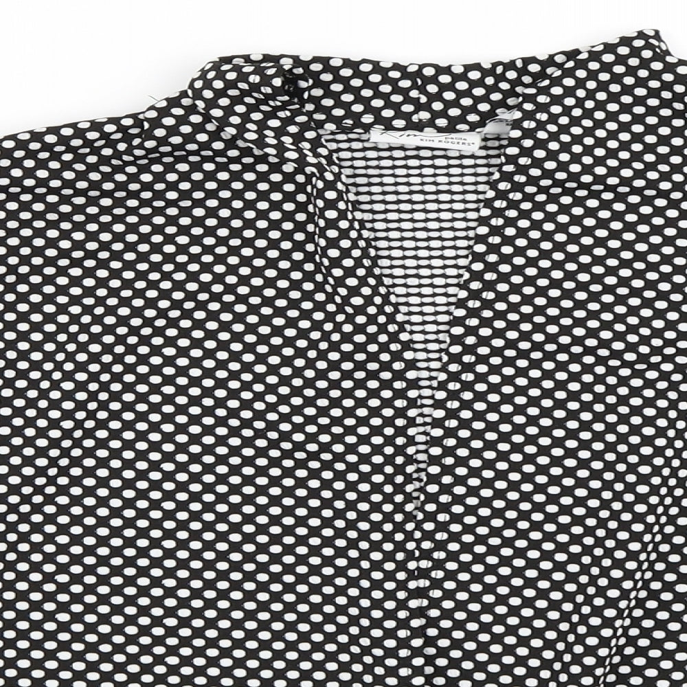 Close-up detail of Kim Rogers women’s black polka dot jacket blazer, size M