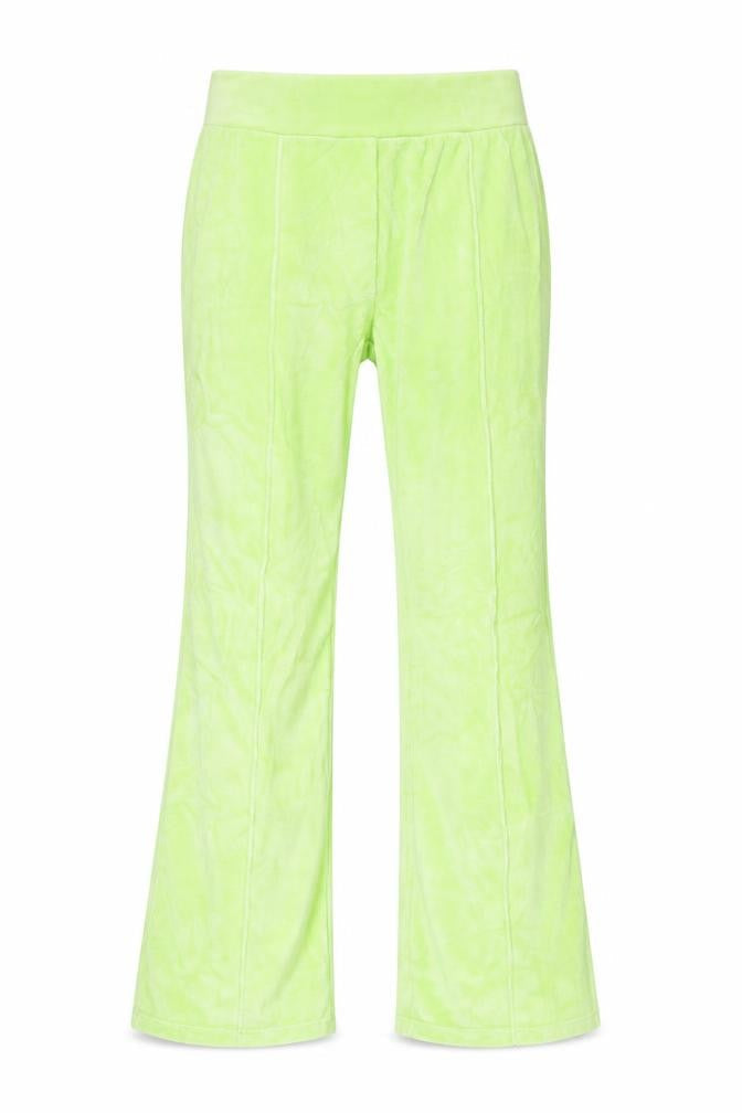Front view of PRETTYLITTLETHING women’s green fleece trousers, size UK 6, 33-inch leg - side splits
