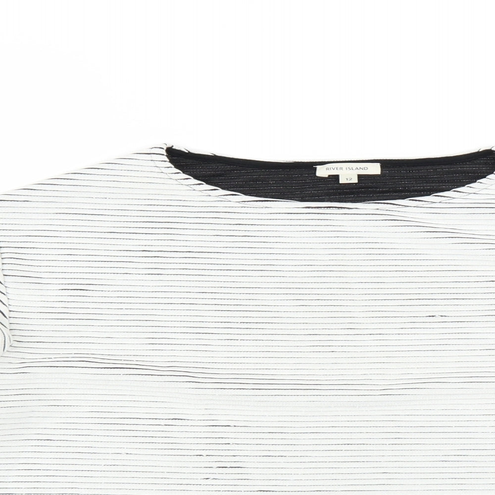Close-up detail of River Island women’s white striped jumper, size UK 12, - cropped