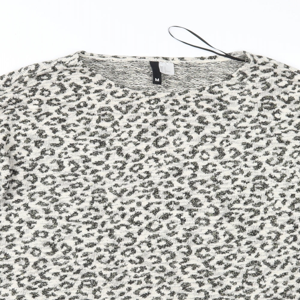 Close-up detail of Divided women’s beige animal print knit jumper, size M