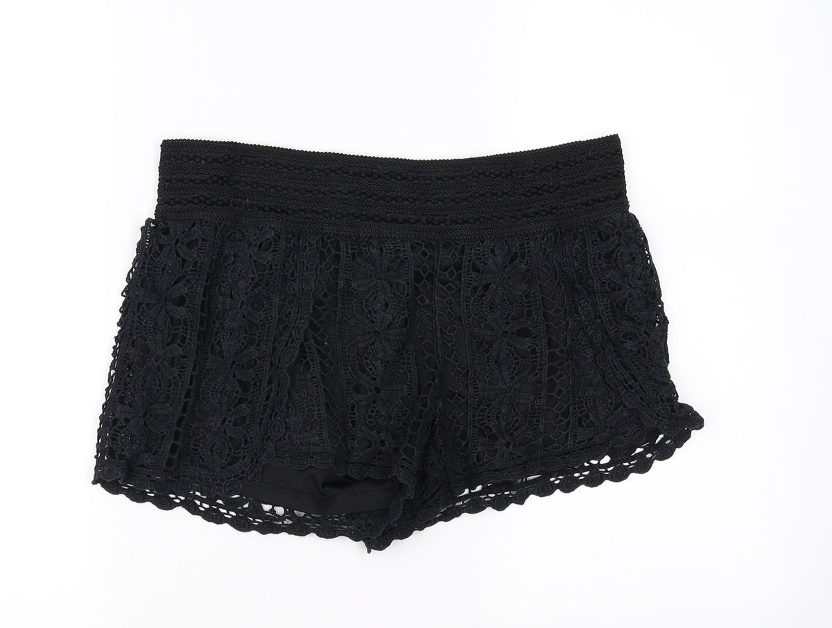 Front view of Rewind women’s black sweat shorts, size L