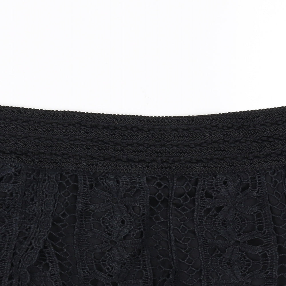 Close-up detail of Rewind women’s black sweat shorts, size L
