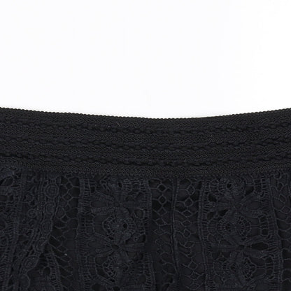 Close-up detail of Rewind women’s black sweat shorts, size L