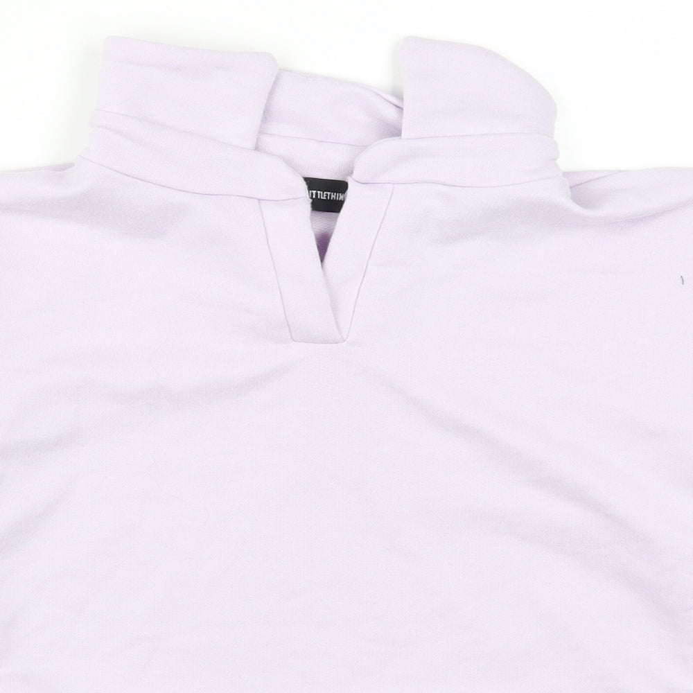 Close-up detail of PRETTYLITTLETHING women’s purple pullover sweatshirt, size UK 4