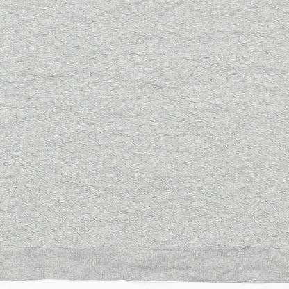 Brand and care label for Topshop women’s grey pullover sweatshirt, size UK 12