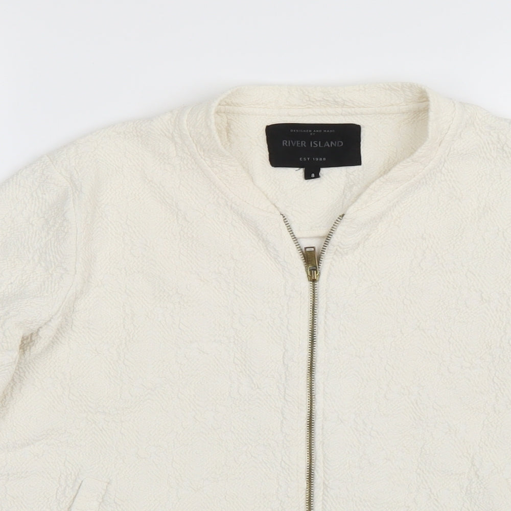 Close-up detail of River Island women’s white jacket coat, size UK 8