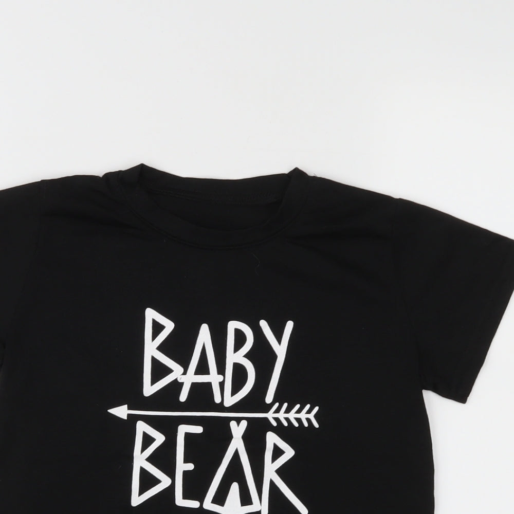 Close-up detail of Preworn boys’ black basic t-shirt, size S