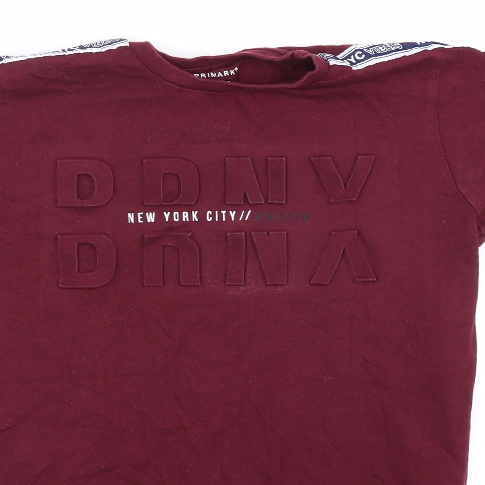 Close-up detail of Primark boys’ purple basic t-shirt, size 8, years