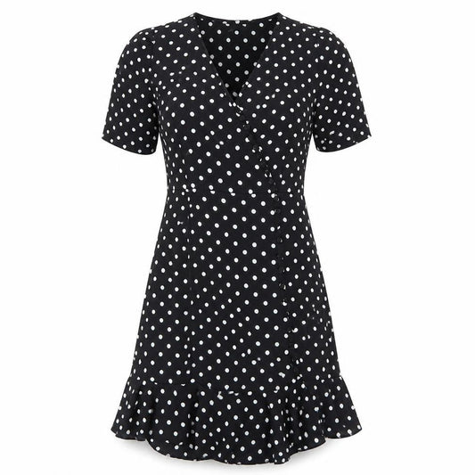 Front view of PRETTYLITTLETHING women’s black polka dot a-line, size UK 2