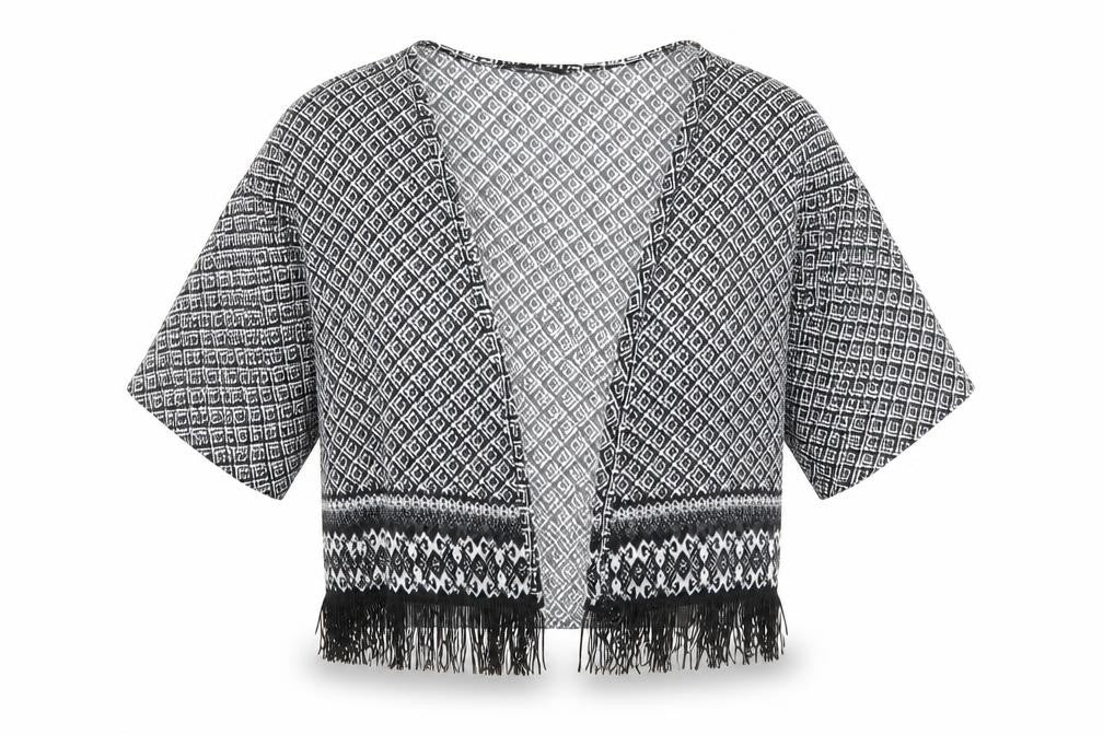 Front view of Candy Couture girls’ black geometric basic blouse, size 10-11, years