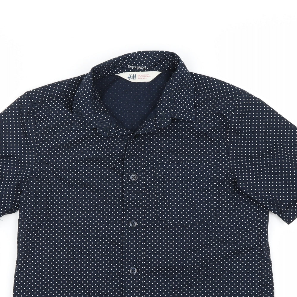 Close-up detail of H&M boys’ blue polka dot basic button-up, size 8-9, years
