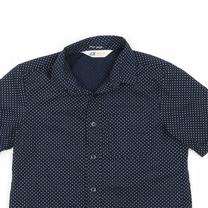 Close-up detail of H&M boys’ blue polka dot basic button-up, size 8-9, years