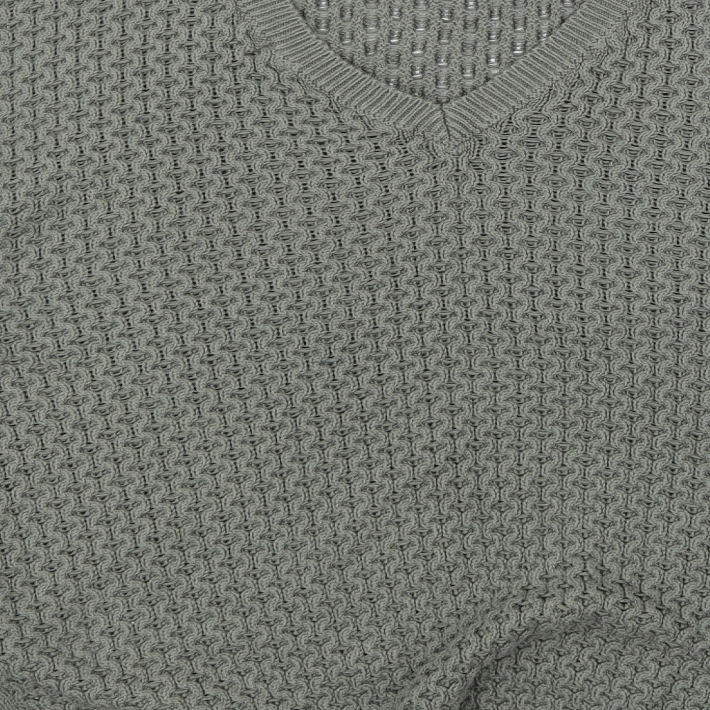 Brand and care label for Primark women’s green knit jumper, size UK 10