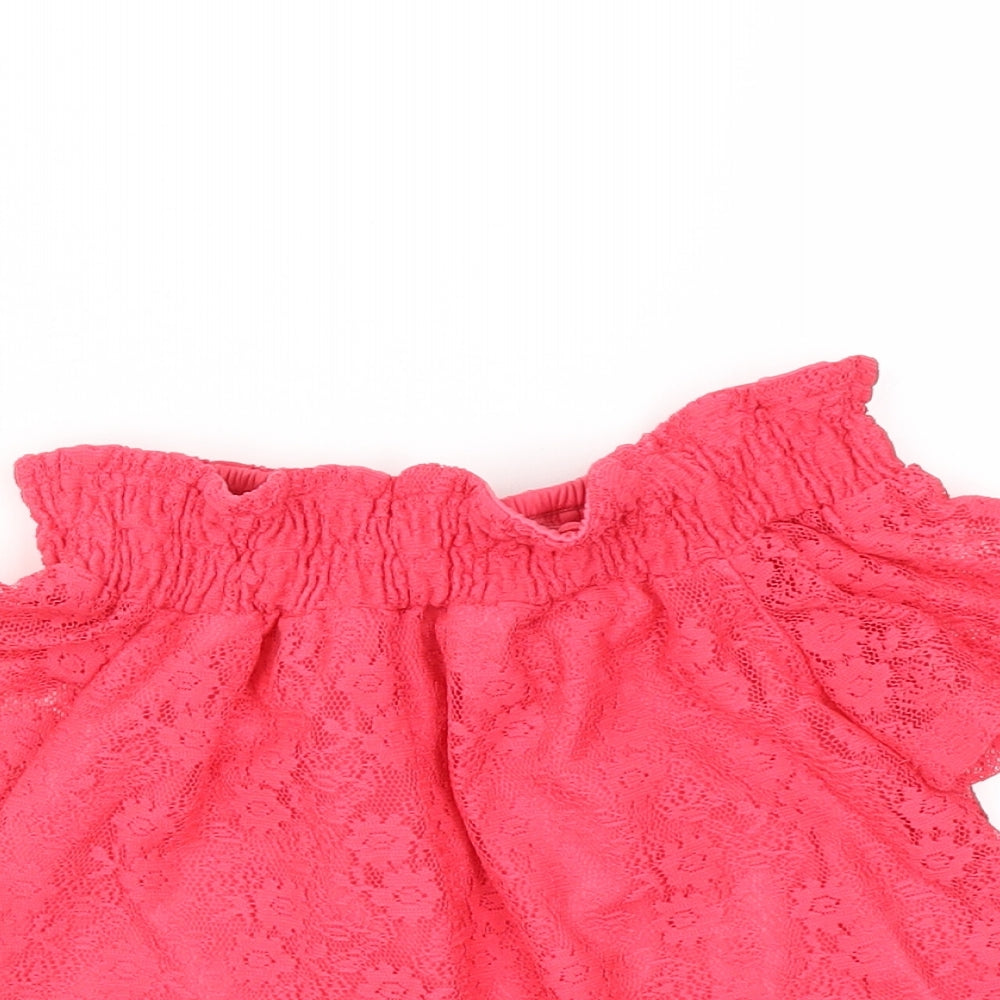 Close-up detail of Primark girls’ red basic blouse, size 8, years