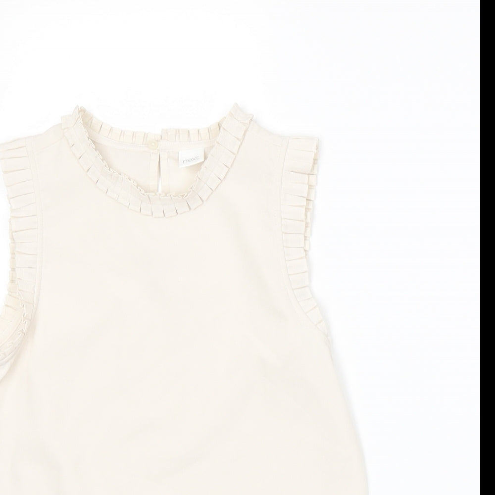 Close-up detail of Next girls’ beige basic blouse, size 9, years