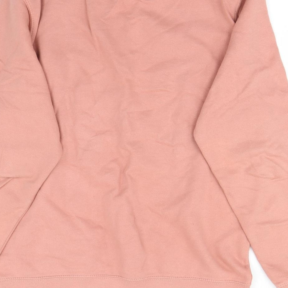Brand and care label for Preworn women’s pink jumper, size M