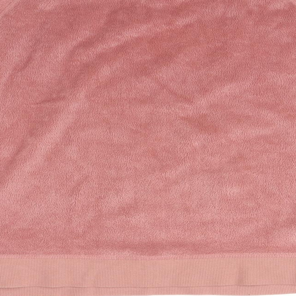 Brand and care label for Topshop women’s pink jumper, size UK 12