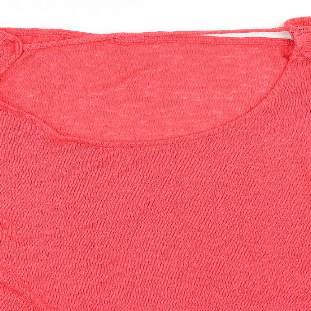 Close-up detail of H&M women’s pink jumper, size L