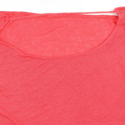 Close-up detail of H&M women’s pink jumper, size L