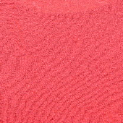 Brand and care label for H&M women’s pink jumper, size L