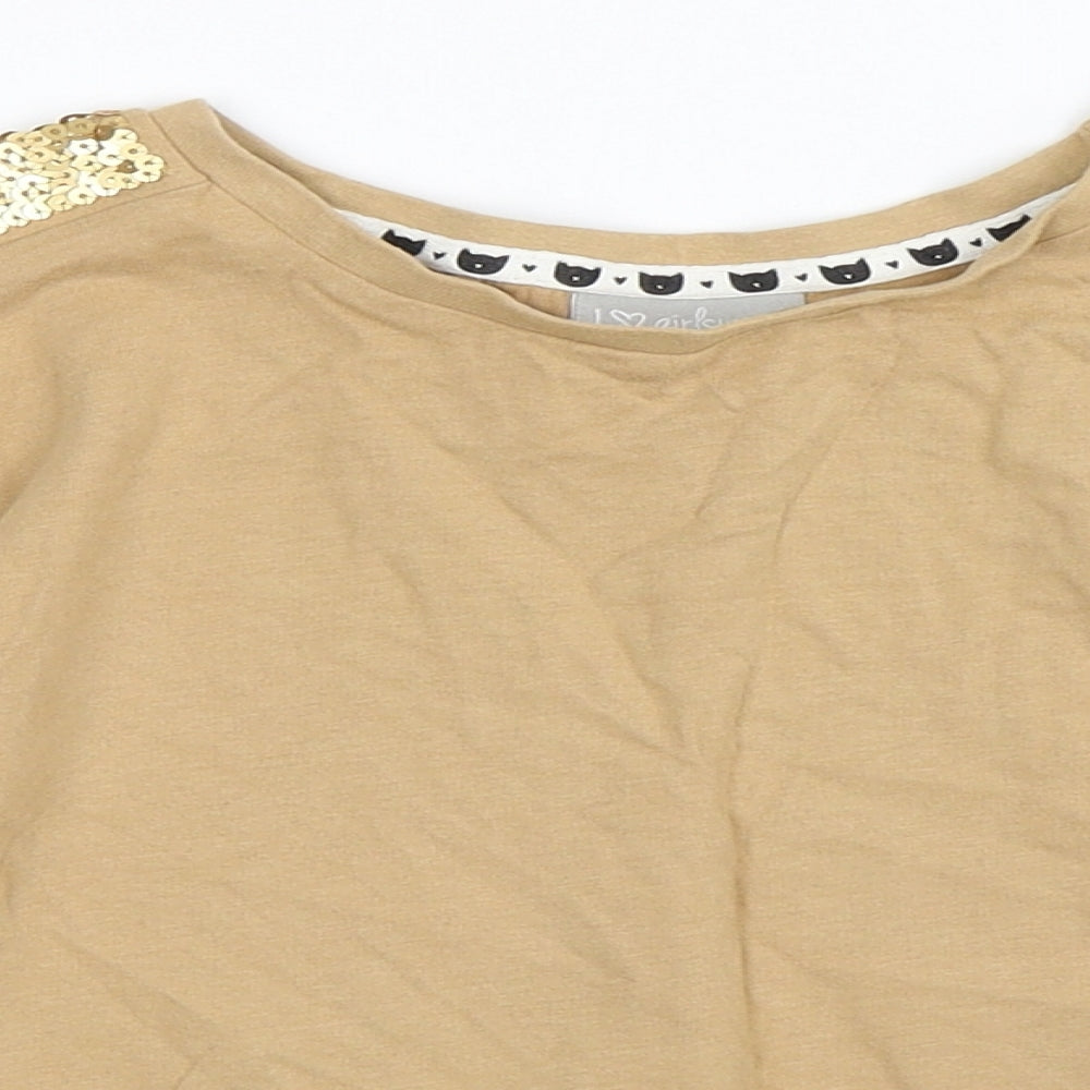 Close-up detail of Matalan girls’ beige basic t-shirt, size 7, years